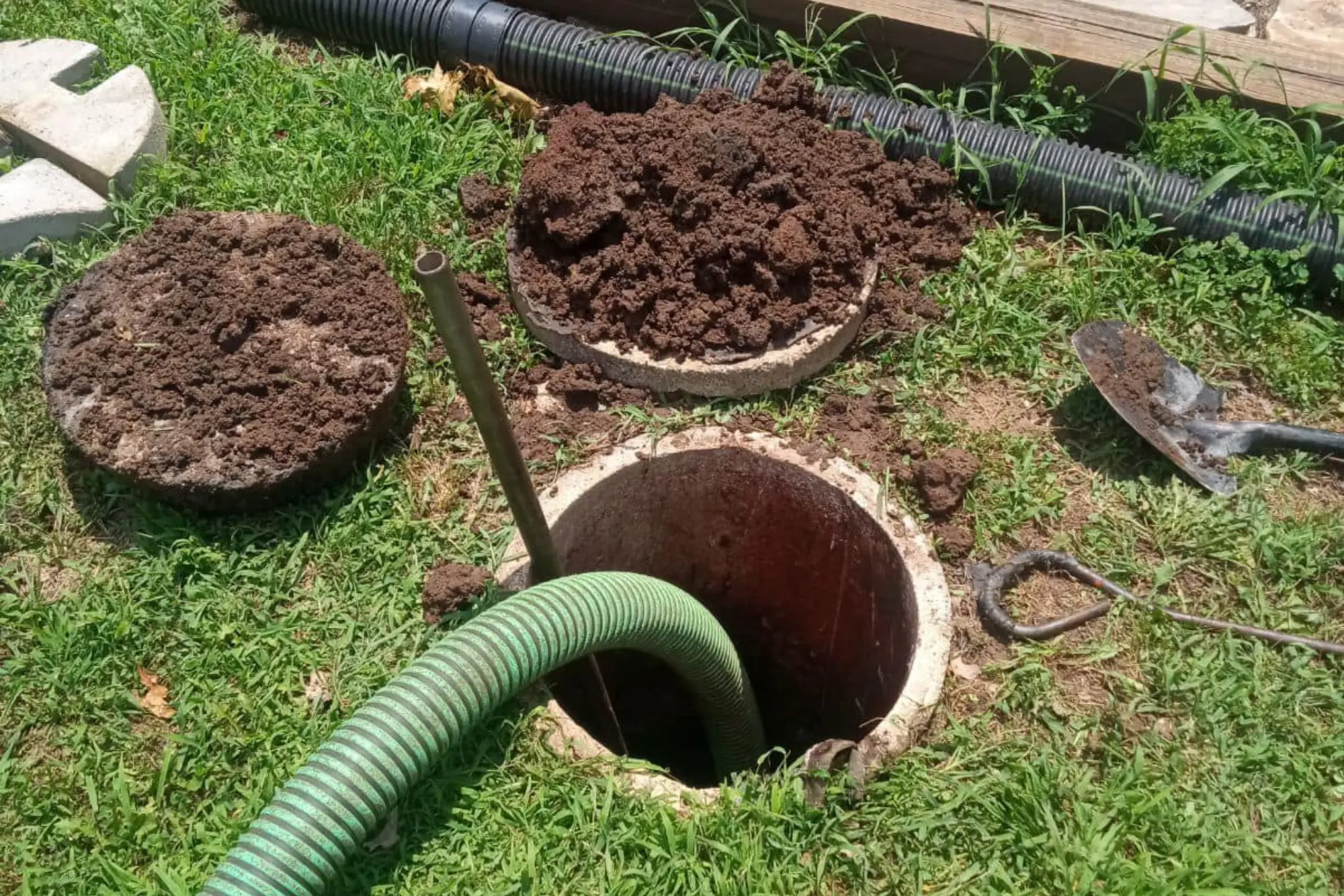 A&A Quick Pump Doing Maintenance on a septic tank